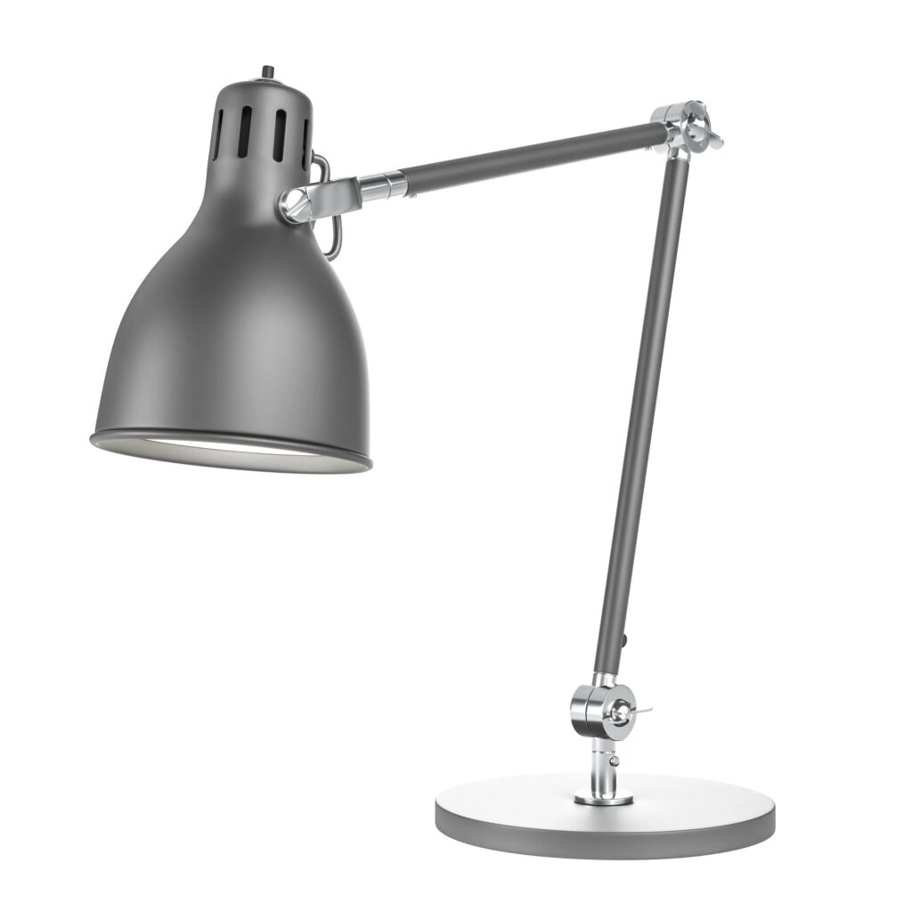 Gray modern adjustable desk lamp illuminating white background